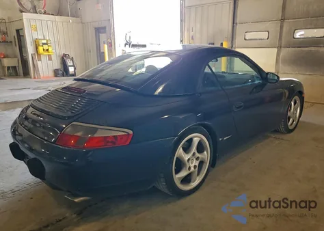 1999 Porsche 911 Carrera z USA, uszkodzony, nr VIN WP0CA2992XS654746